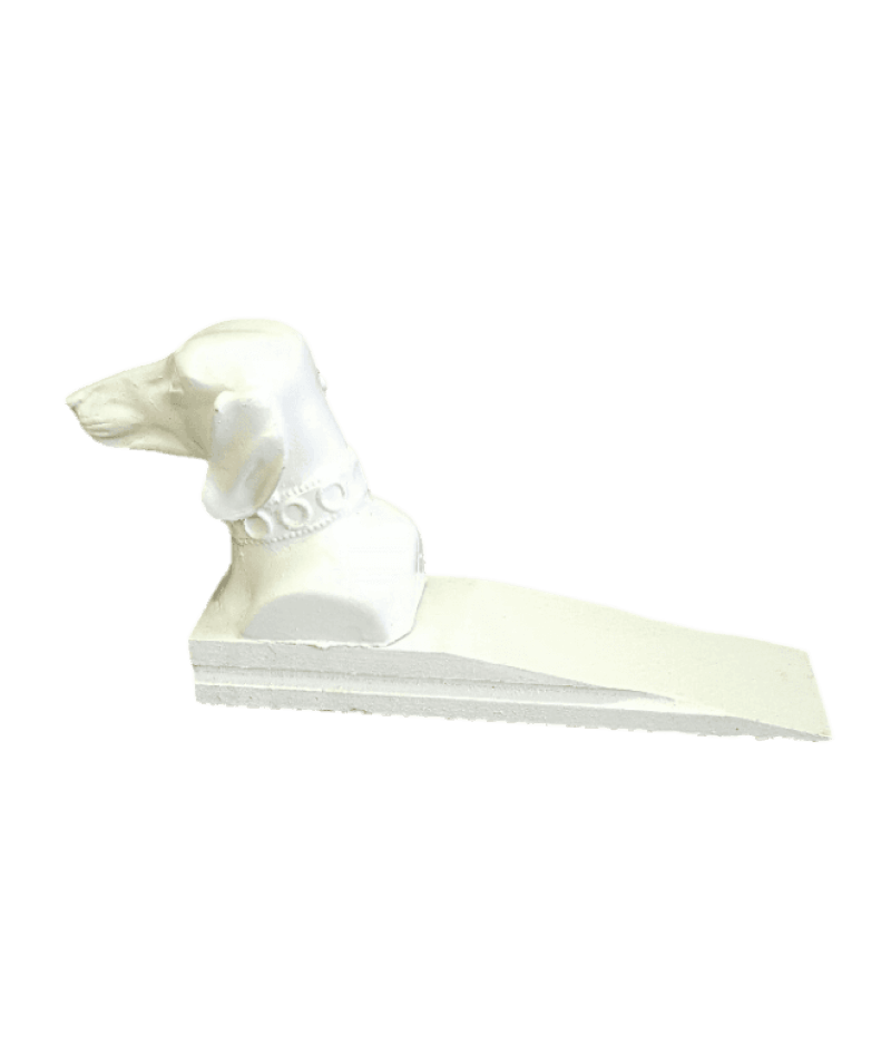 White dog-shaped door stopper on a black background