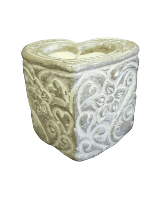 Decorative stone planter with intricate patterns on a black background